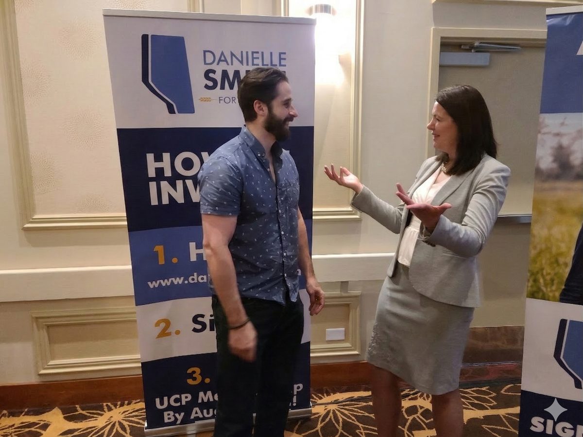 Cole Kander with Premier Danielle Smith on her UCP leadership campaign