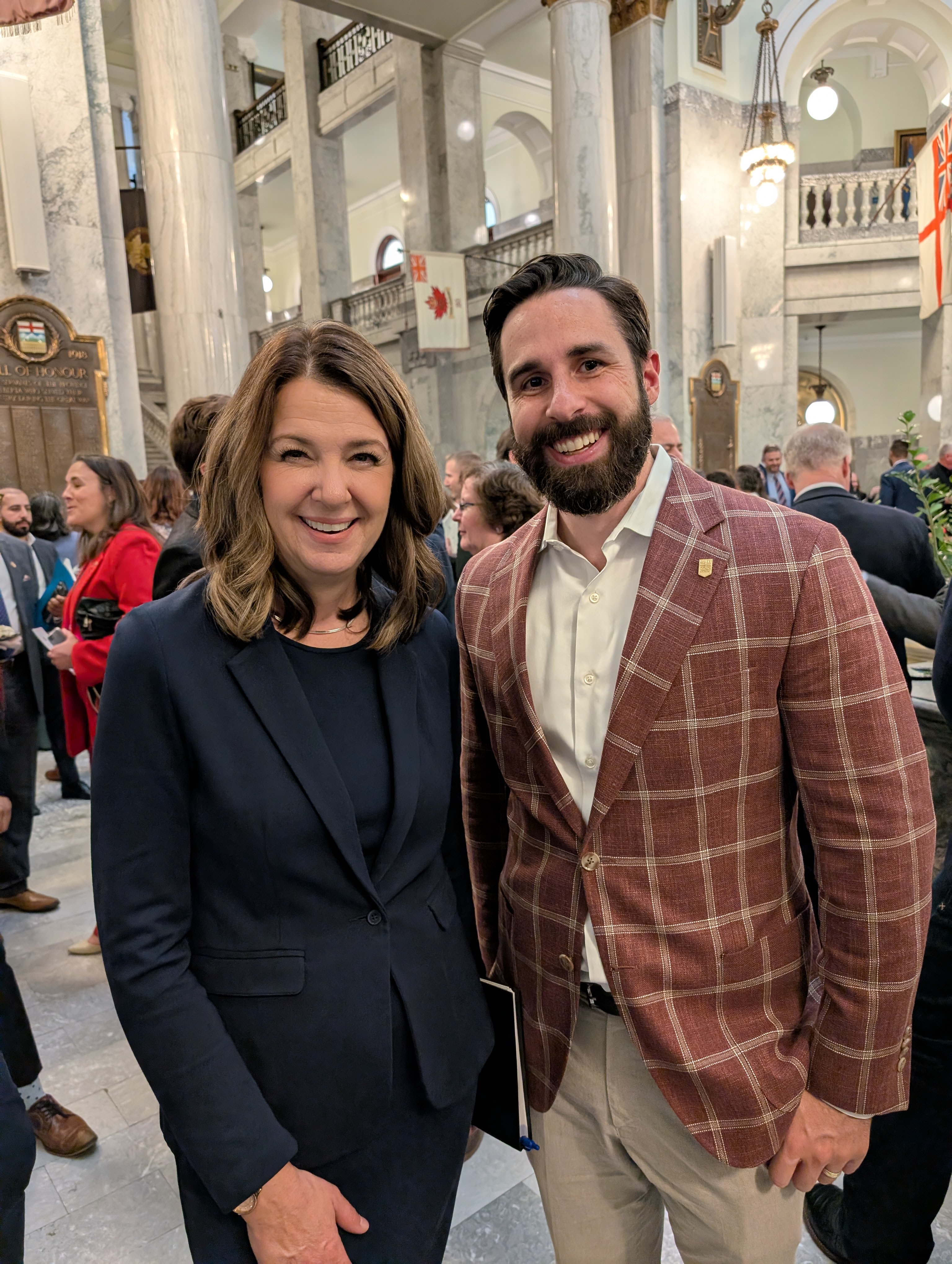 Cole Kander with Premier Danielle Smith at the Alberta Legislature