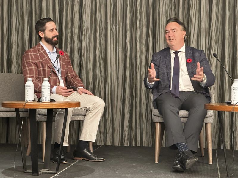 Cole Kander with Minister Dale Nally during a fireside chat